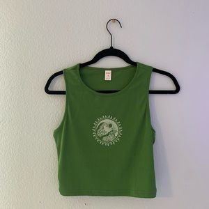green cropped top
